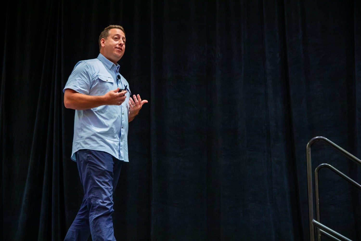 Tyler Kelley speaking on stage
